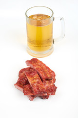Roasted pork ribs and beer isolated on white background