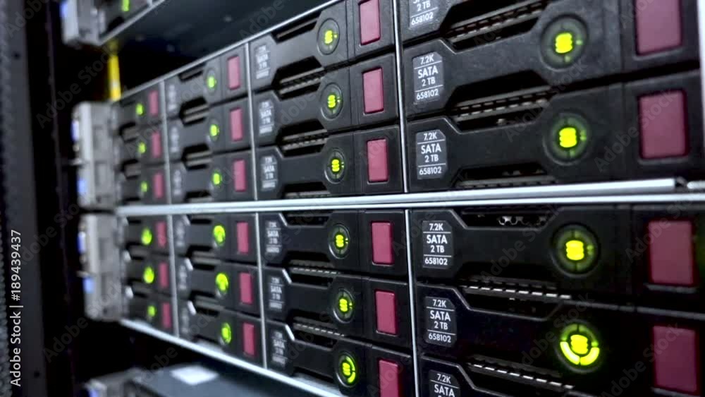 Poster storage hdd server. flashing lamp. data servers rack with many hard drives and led lamps flashes.