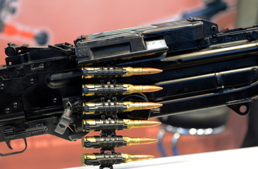 Tape with live ammunition in a machine gun.