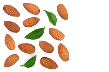 almonds with leaves isolated on white background with copy space for your text. Top view. Flat lay pattern