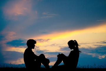 Fototapeta na wymiar couple silhouette at sunset
