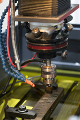 operator use  EDM electrod to make precision mold and die