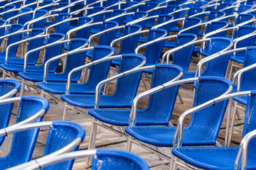 Naklejka premium Blue chairs in outdoors event