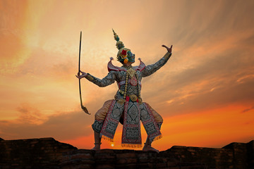 Art culture Thailand Dancing in masked khon Tossakan in literature ramayana on the brick wall at...