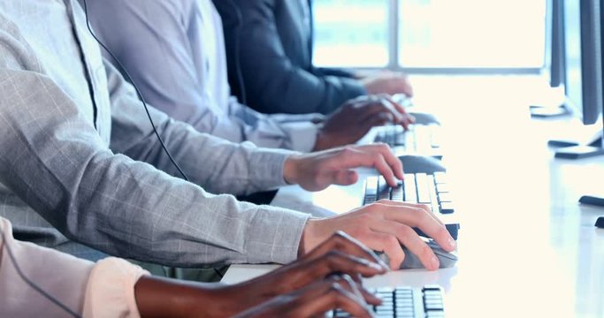 Customer service executives working at office 