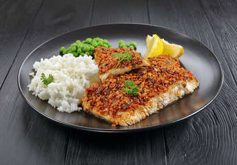 white fish fillet with rice and lemon