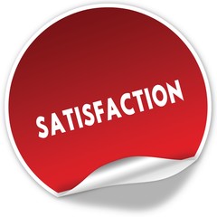 SATISFACTION text on realistic red sticker on white background.