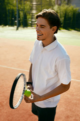 Sports Man Before Playing Tennis On Court.