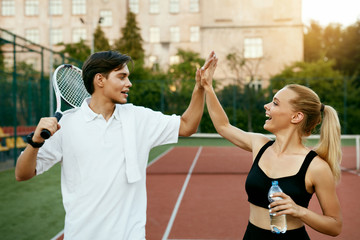 Happy Couple After Playing Tennis