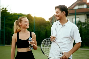 Foto op Canvas Happy Couple After Playing Tennis © puhhha