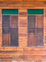 The antique old wooden window in Thailand.