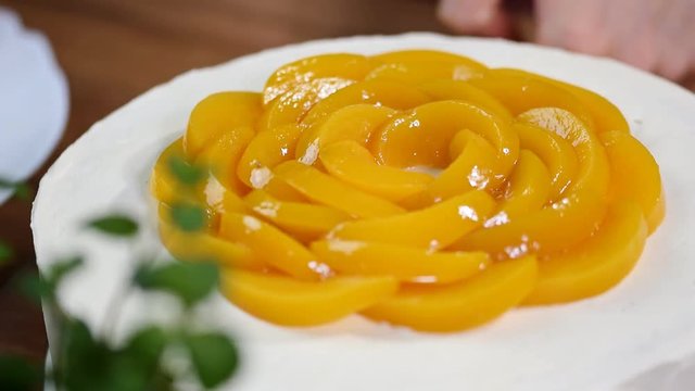 Decorate the cake with peaches - Powered by Adobe