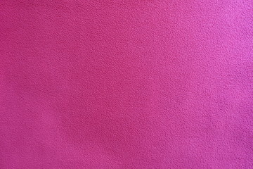 Cerise colored polar fleece fabric from above