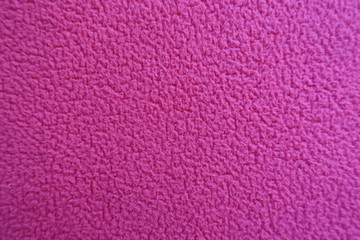 Magenta polar fleece fabric from above (closeup)