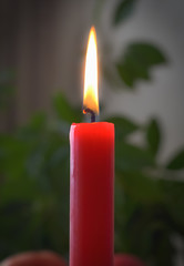 Red burning candle