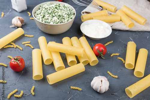 Raw Cannelloni On A Grey Table Traditional Italian Food