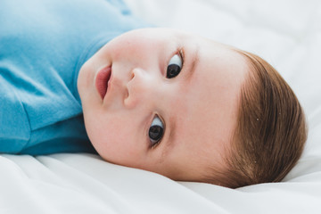 Face of adorable baby looking at camera