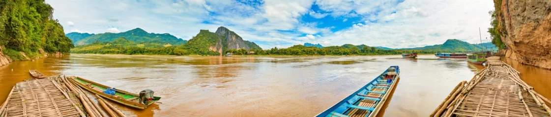 Fotobehang Touristic boats. Beautiful landscape panorama, Laos. © Olga Khoroshunova