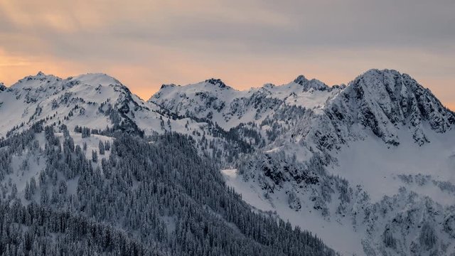 Breathtaking Sunset Timelapse of Snowy Cascade Mountain Range