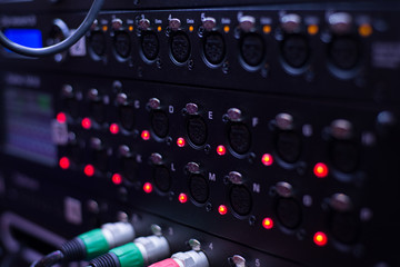 Sound system , Sound cable on  studio in plug.  wires plugged into sound amplifiers