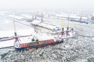 Fototapeta premium Aerial: The port of Kaliningrad in the cold winter