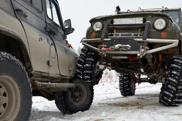 Russian Off-road car on winter landscape