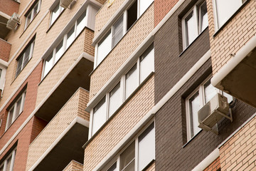 Multi-storey houses in the city as a background