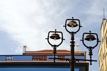 Rusty vintage street lamps in old town, Spain