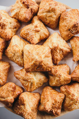 Crispy cheese puff pastries with seeds. Close up