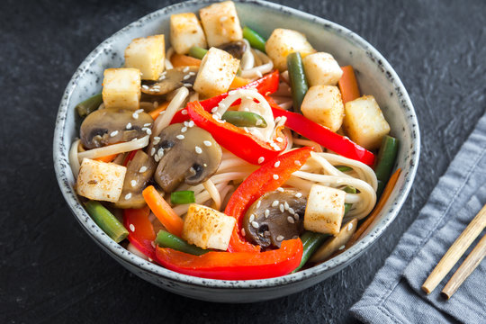 Stir fry with noodles, tofu and vegetables