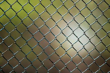 Fototapeta premium Metal mesh on the fence as a background