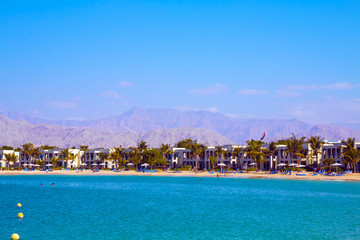 The luxury resort with mountains in background