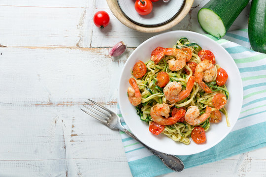 Zucchini noodles sauteed with cherry tomato and prawns