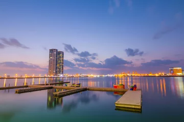 Fotobehang Ras Al Khaimah by night. View to beautiful bay with harbour in background © johnkruger1
