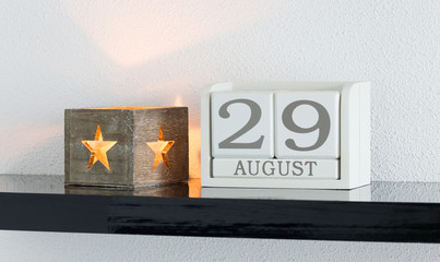 White block calendar present date 29 and month August
