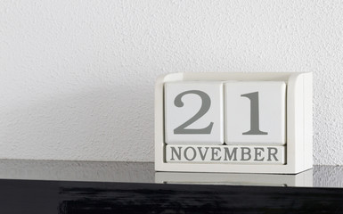 White block calendar present date 21 and month November