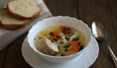 fish soup in a white bowl