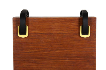 two clamps hold wooden bars