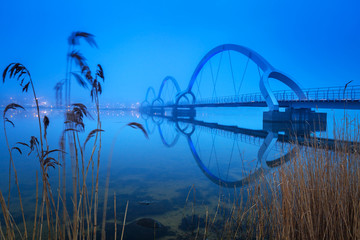 Solvesborgsbron pedestrian bridge at dusk in Sweden. At 756 meters the longest pedestrian bridge in Europe.