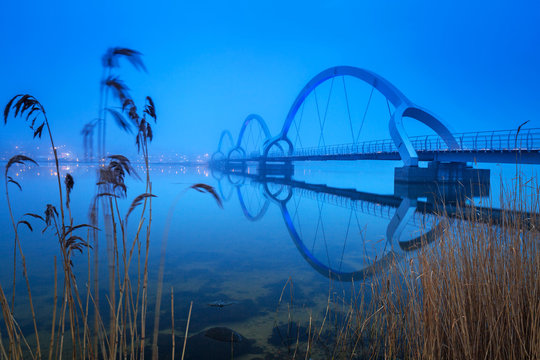 Solvesborgsbron pedestrian bridge at dusk in Sweden. At 756 meters the longest pedestrian bridge in Europe.