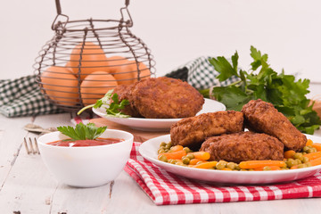 Meatballs on white dish. 