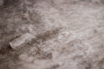 Wet ice on tarmac