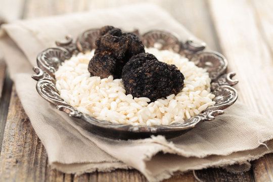 Black truffles and white rice.