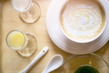 Obraz na płótnie Canvas hot caramel coffee in the white cup