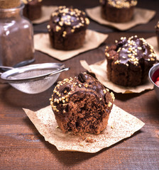 chocolate muffin with a sprinkle of nuts
