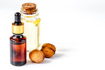 cosmetic and therapeutic walnut oil on white background