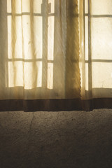 An old curtain on a window