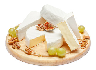 pile of brie or camambert cheese on white background