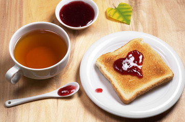 Toasted bread with jam and tea