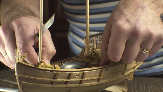 Man collects a model of the ship video